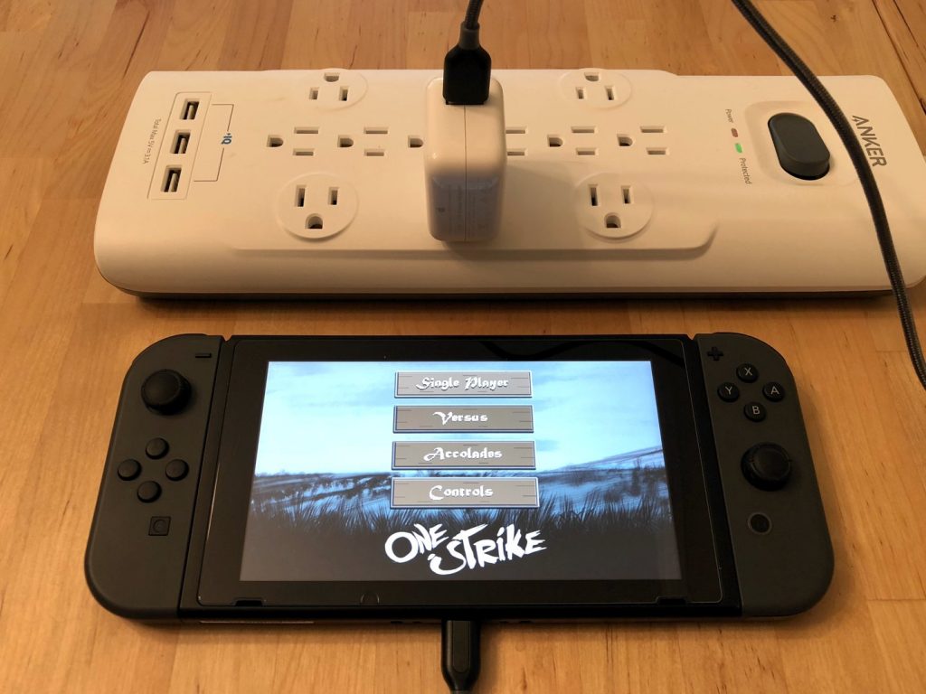 Apple 12W USB Charger with Nintendo Switch. Cable not included.