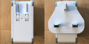 Zikko eLuggage L charger with built-in US plug and connected UK plug.