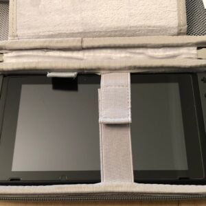 Nintendo Switch secured into the Inateck Carrying Case. Nintendo Switch secured into the Inateck Carrying Case.