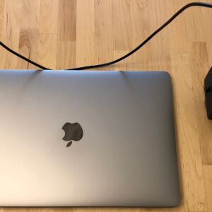 Amoner Universal Travel Adapter with MacBook Pro and 60W US charger Amoner Universal Travel Adapter with MacBook Pro and 60W US charger