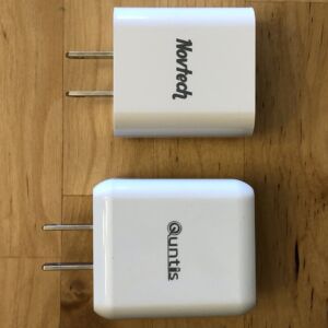 Top: Novtech 18W PD Charger. Bottom: Quntis PD Fast Charger. Top: Novtech 18W PD Charger. Bottom: Quntis PD Fast Charger.